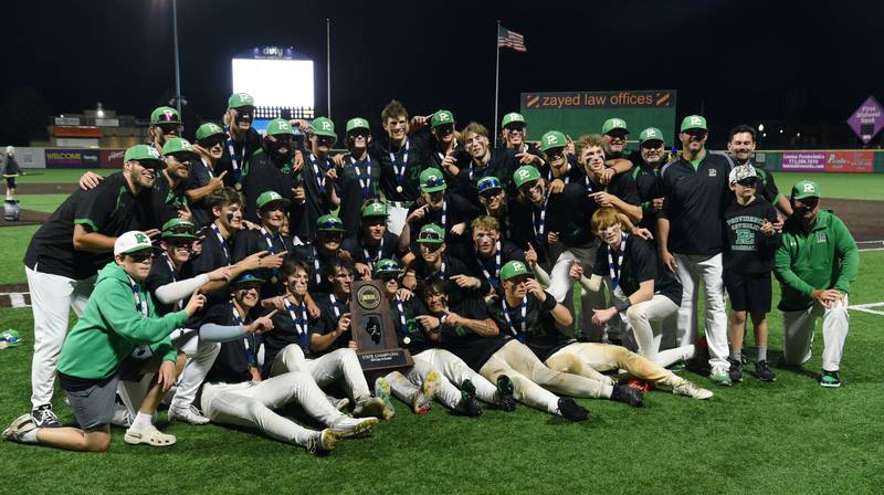 Providence players pose with their championship trophy after their 4-1 victory over Conant during the Class 4A state baseball championship game at Duly Health and Care Field on Saturday, June 8, 2024 in Joliet.