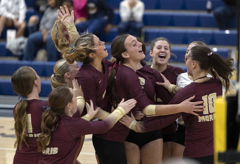 Morris celebrates their come from behind third set win over Sterling Thursday, Oct. 30, 2025, in the Class 3A volleyball regional.