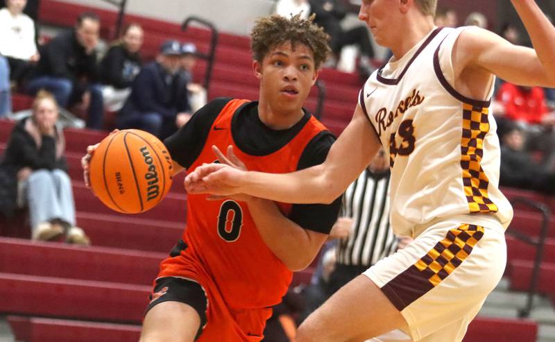 Crystal Lake Central’s Avery Lee moves the ball in varsity boys basketball E.C. Nichols tournament championship game action on Saturday, Dec. 27, 2025, at Homer “Bill” Barry Gymnasium on the campus of Marengo High School in Marengo.