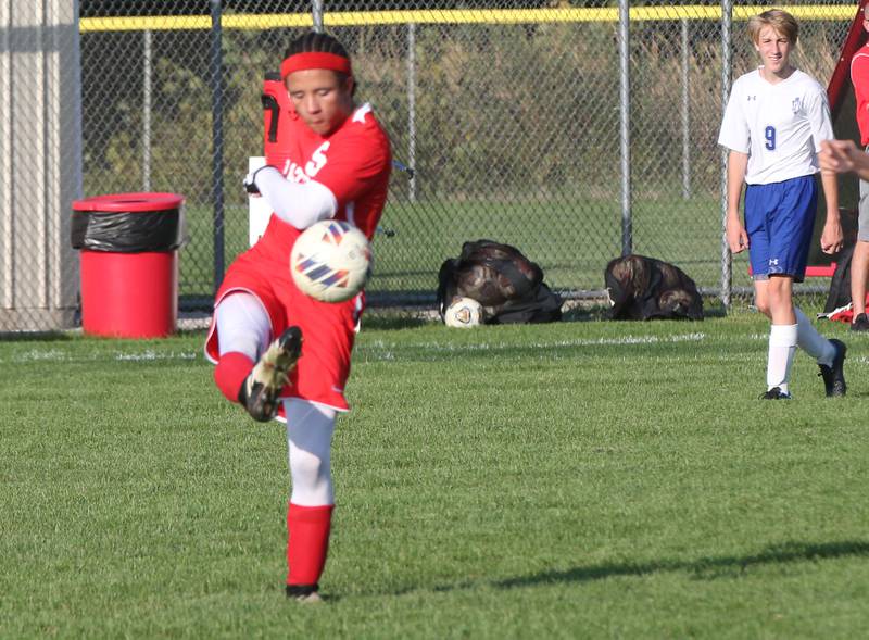 Ottawa's Malikhai Stayton kicks the ball down the field while playing Princeton on Tuesday, Oct. 3, 2023 at Ottawa High School.