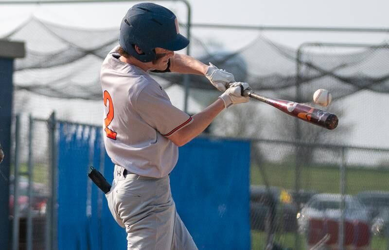 Oswego’s Chase Gerwig (2) doubles against Oswego East during a baseball game at Oswego East High School on Tuesday, May 10, 2022.
