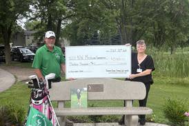 DeKalb man donates thousands to cancer center in late wife’s memory