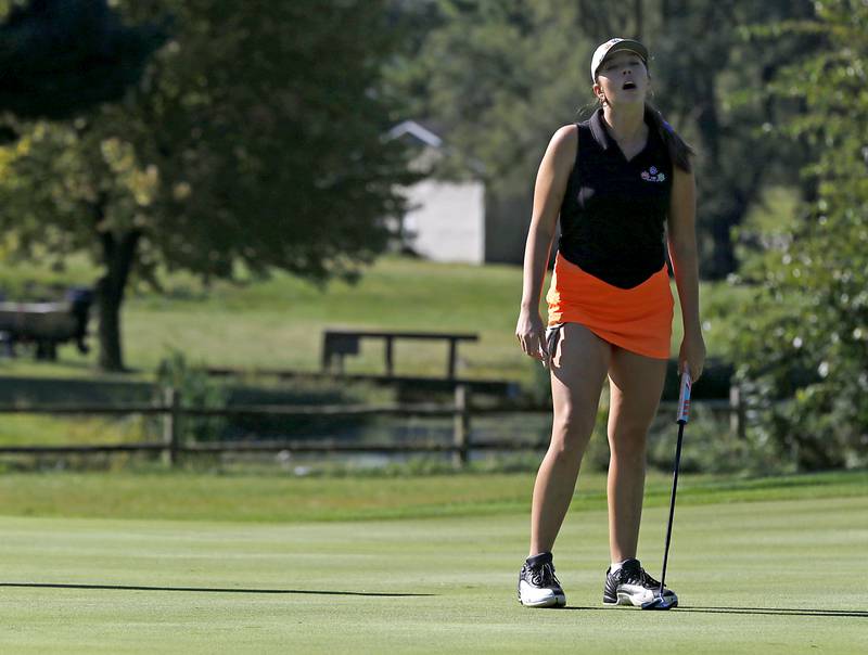 Crystal Lake Central’s Delaey Medlyn reacts to missing a putt on the 5th green during the Fox Valley Conference Girls Golf Tournament Wednesday, Sept. 25, 2024, at Crystal Woods Golf Club in Woodstock.