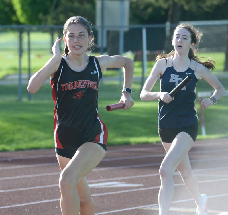 Forreston-Polo's Hannah Harvey runs a leg  in the 4x800 relay at the 1A Oregon Sectional on Friday. May 10, 2024. The realy team finished in third place, 11:07.28.