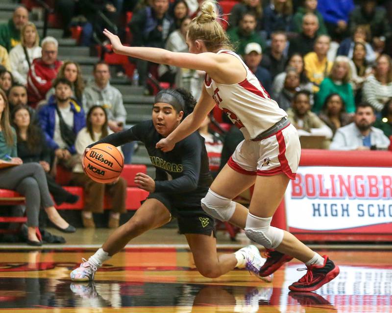 Waubonsie Valley's Arianna Garcia (1) crosses up the defense before shooting a jumper during their Class 4A Bolingbrook Sectional final basketball game between Waubonsie Valley at Benet. Feb 27, 2025 in Bolingbrook.