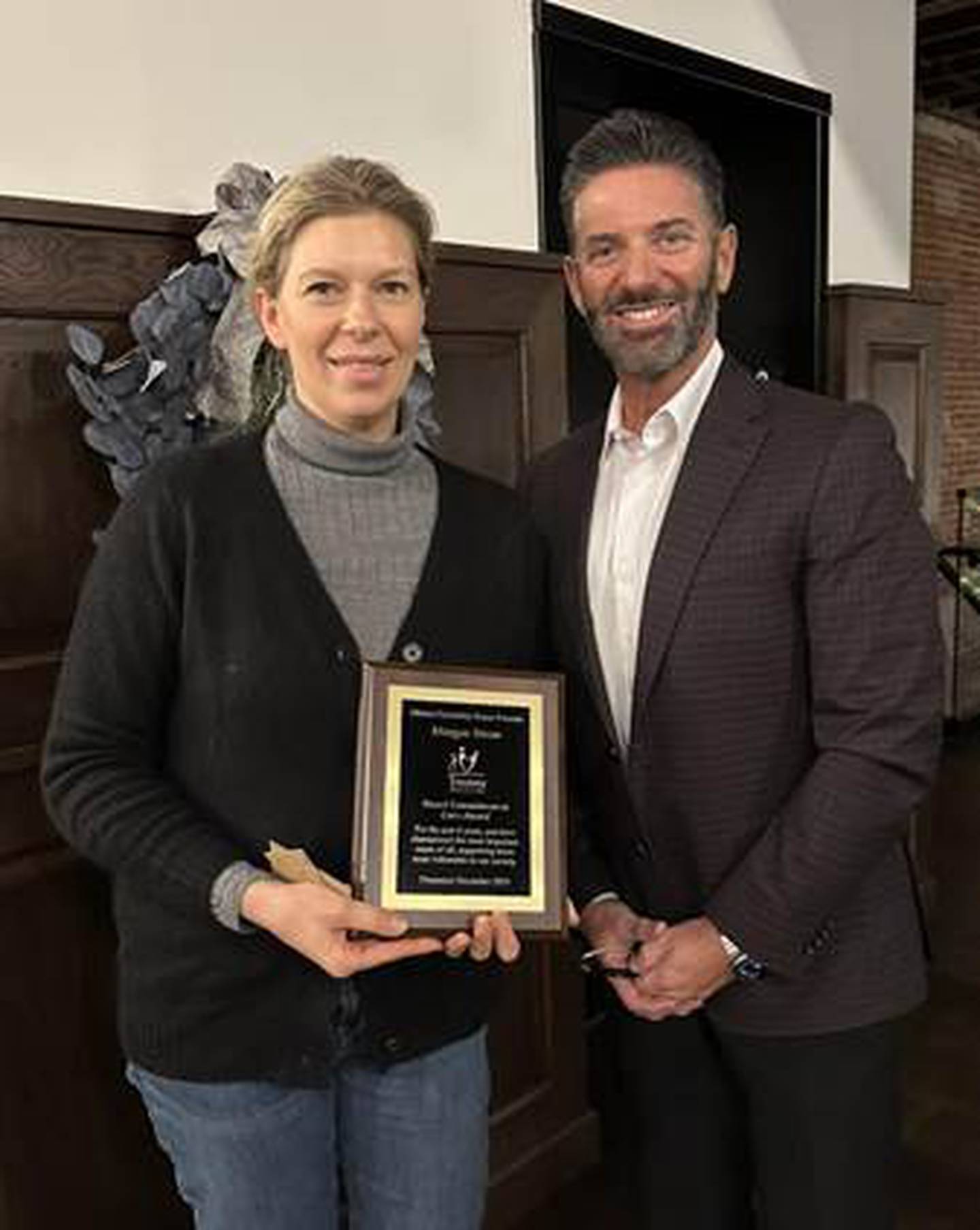 Morgan Strow was recognized for her six years of dedicated service on our board of directors. Pictured is Morgan Straw and Executive Director Tony Barrett.