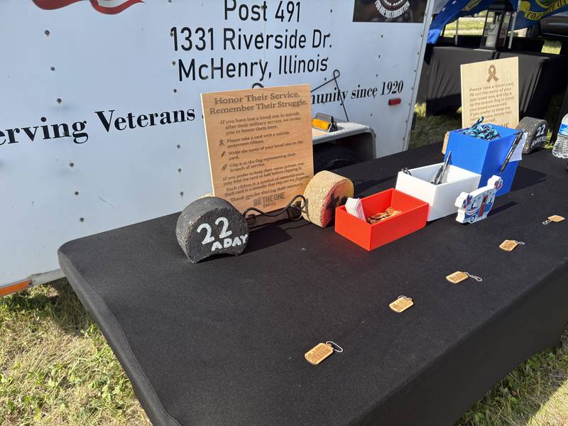 A table at the suicide awareness tent at the Field of the Fallen in Cary May 23, 2026.