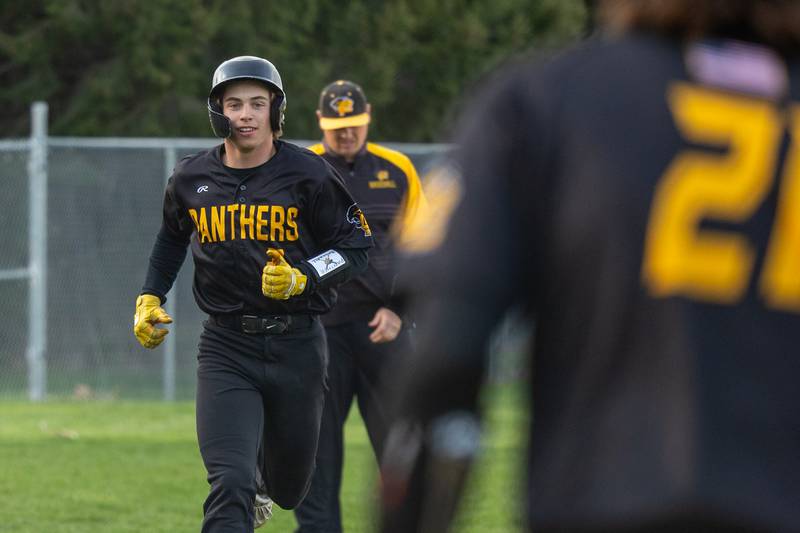 Johnathan Stunkel (3) of Putnam County runs to home plate after hitting home run on Thursday, April 17, 2025 at Woodland High School in Streator.