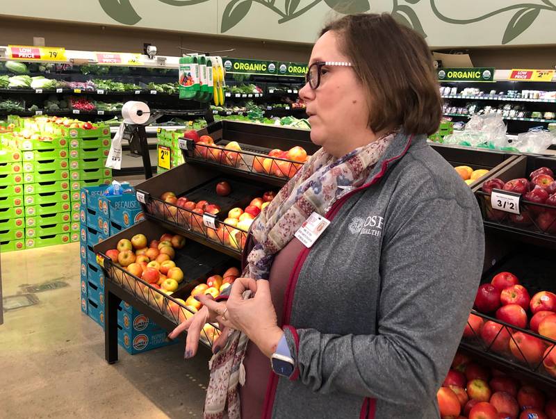 Anne Lauterjung gives an introduction to the OSF grocery store tour in the produce aisle at Kroger in Ottawa on Sunday, Nov. 13, 2022.