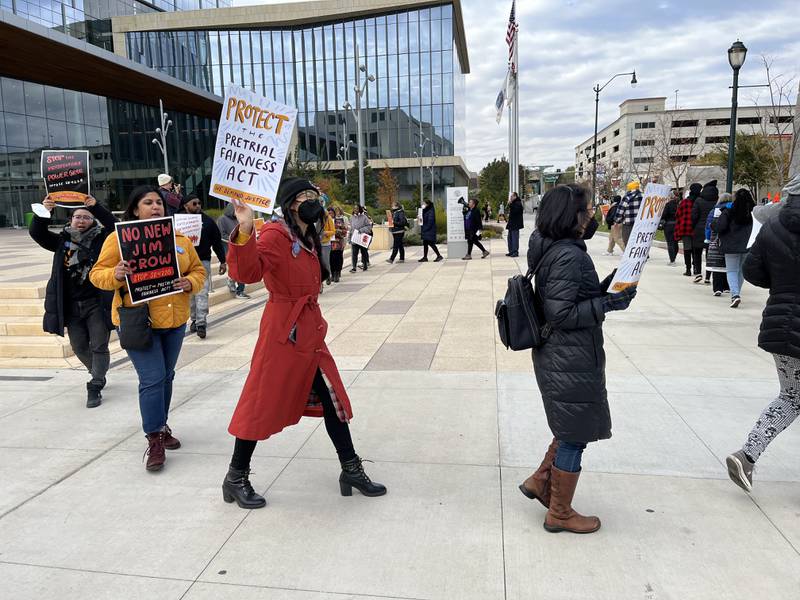 Protestors gather in downtown Joliet near the Will County Courthouse on Thursday, Oct. 20, 2022, in support of the SAFE-T Act.