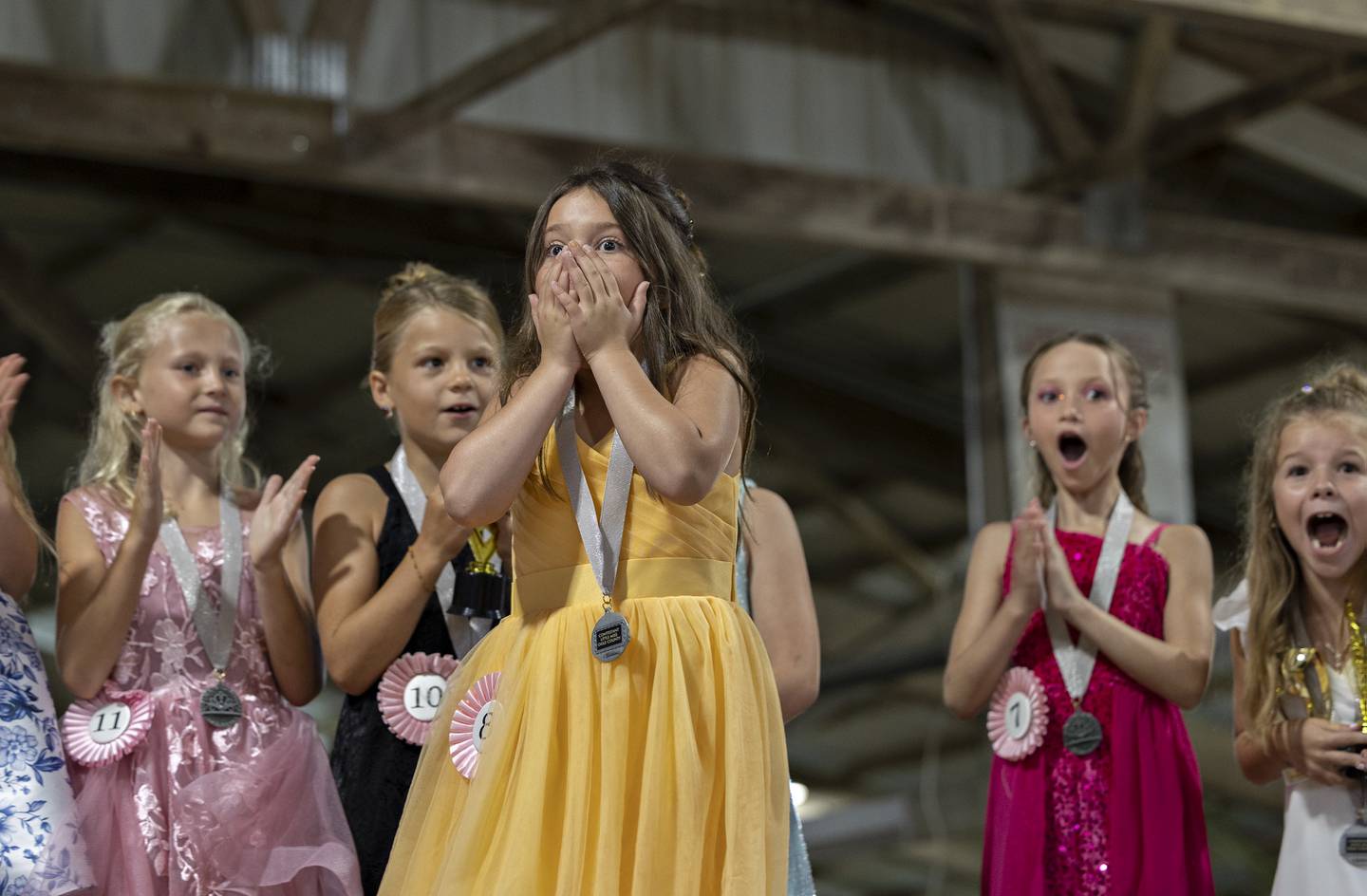 Emerson Quinn, 8, reacts to winning the Little Miss Ogle County pageant, Thursday, July 30, 2025, at the Ogle County Fairgrounds.