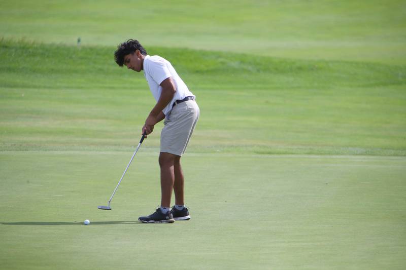 St. Charles East's Aarnav Patel shots a putt at the Class 3A St. Charles North Regional on Wednesday, Oct. 1, 2025 at Bowes Creek Country Club in Elgin.