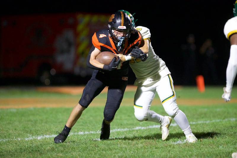 Crystal Lake Central's Kelley Carter looks to make a gain against Crystal Lake South on Friday, Sept. 27,2024 in Crystal Lake.