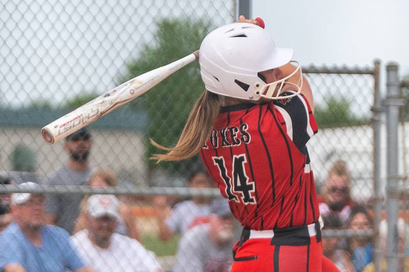 Yorkville's Sara Ebner (14) doubles driving in two runs against Oswego East during the Class 4A Oswego softball sectional semifinal game between Yorkville and Oswego East at Oswego High School on Tuesday, May 30, 2023.
