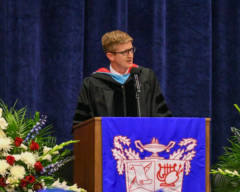 Assistant Superintendent for Finance and Operations addresses the graduating glass at Glenbard South High School on Thursday May 23, 2024.