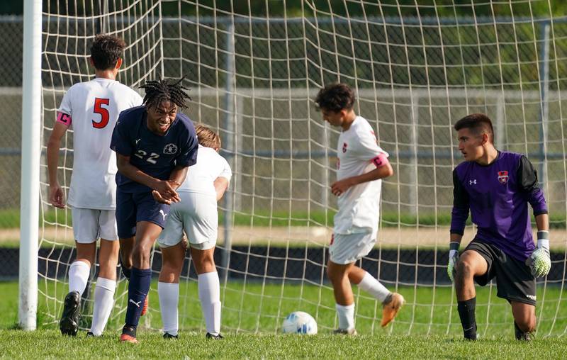 Oswego East's Marlin Hoffman (22) reacts after scoring a goal against Oswego during a soccer match at Oswego East High School on Tuesday, Sept. 26, 2023.
