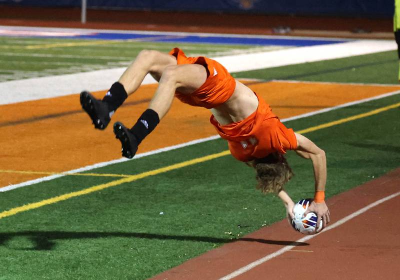 Hersey's Nate Mabry flips and throws the ball in Friday, Nov. 8, 2024, during their Class 3A state semifinal game against Hinsdale Central at Hoffman Estates High School.