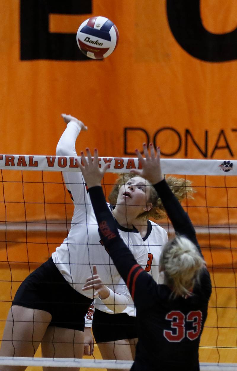 Crystal Lake South's Nolan Getzinger tries to hit the ball past the block of Huntley’s Ally Panzloff during a Fox Valley Conference volleyball match Tuesday, Aug. 23, 2022, between Crystal Lake Central and Huntley at Crystal Lake Central High School.