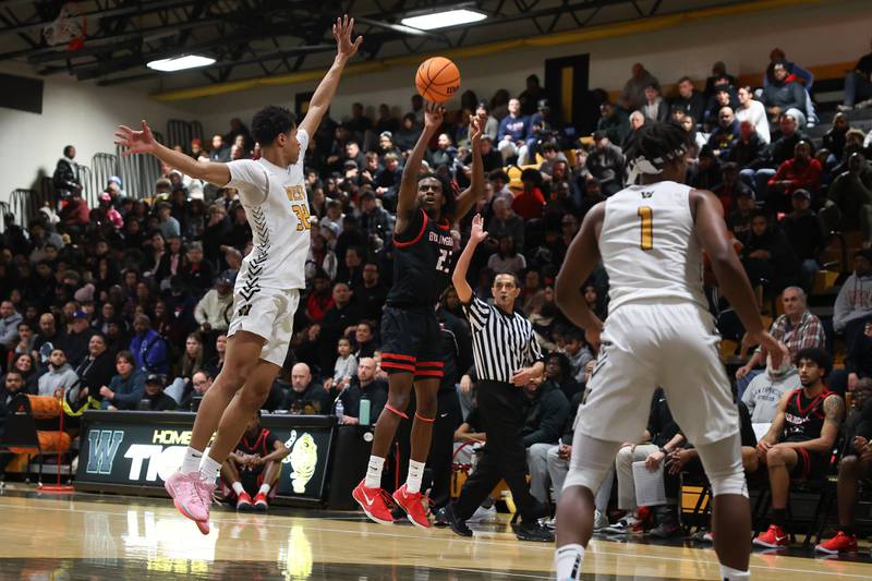 Bolingbrook’s Kendall Cutler puts up the 3-point shot against Joliet West on Friday, Jan 24, 2025 in Joliet.