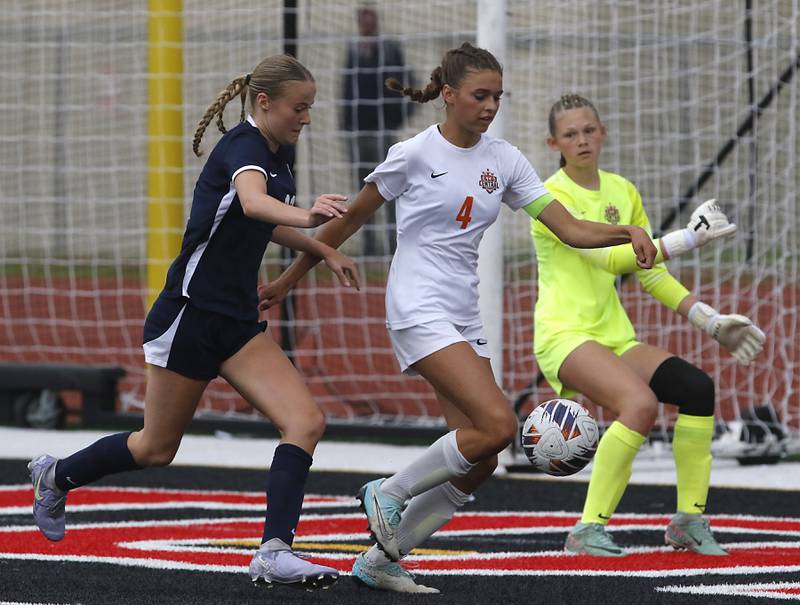 Crystal Lake Central's Hadley Ferrero takes the ball away from St. Viator's Kalin Mccrea during the IHSA Class 2A Deerfield Sectional championship girls soccer match on Friday, May 30, 2025, at Deerfield High School.
