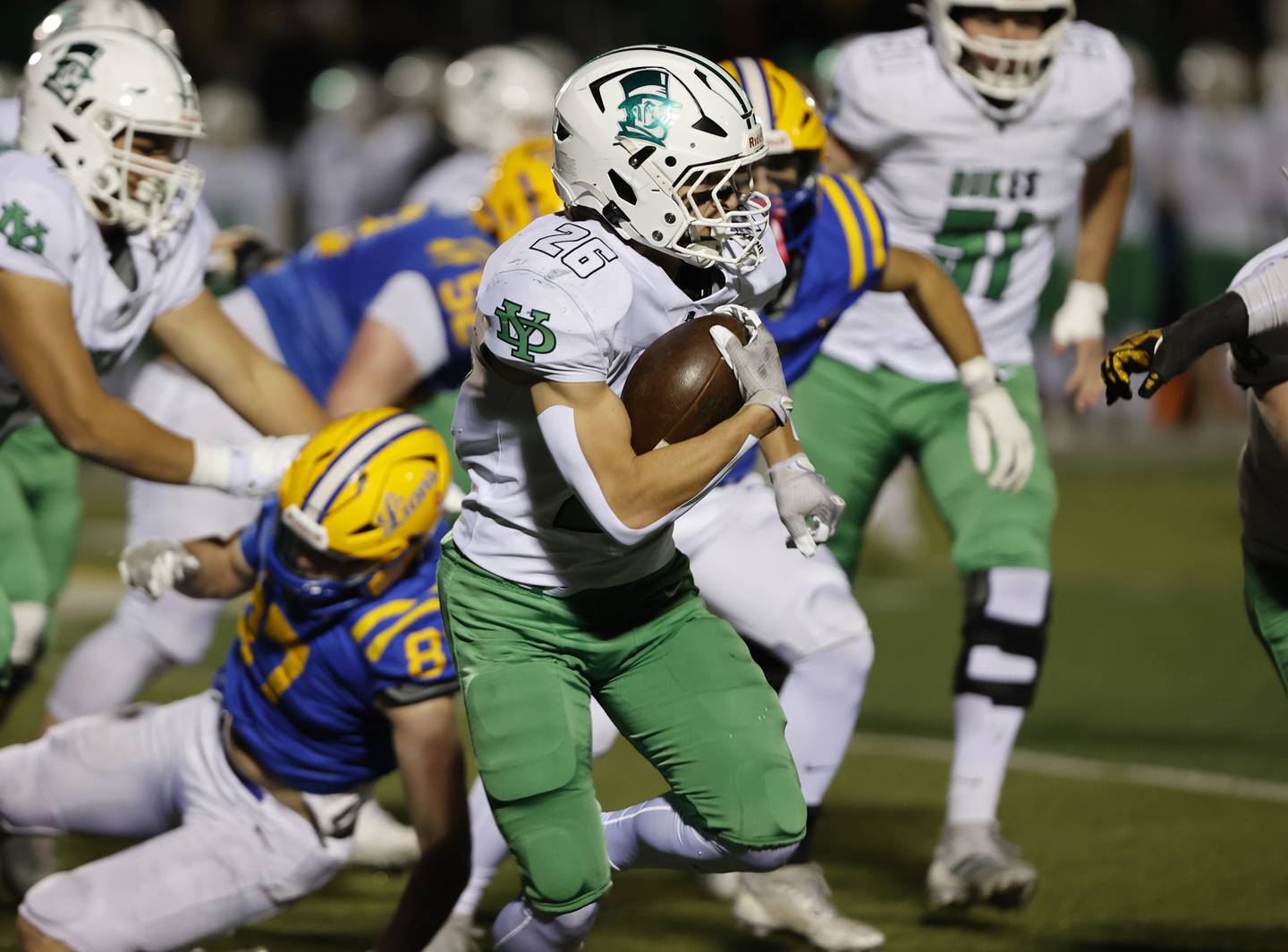 York's Henry Duda (26) runs with the ball during the varsity football first-round 8A playoff game between York and Lyons Township on Friday, Oct. 31, 2025 in Western Springs, IL.