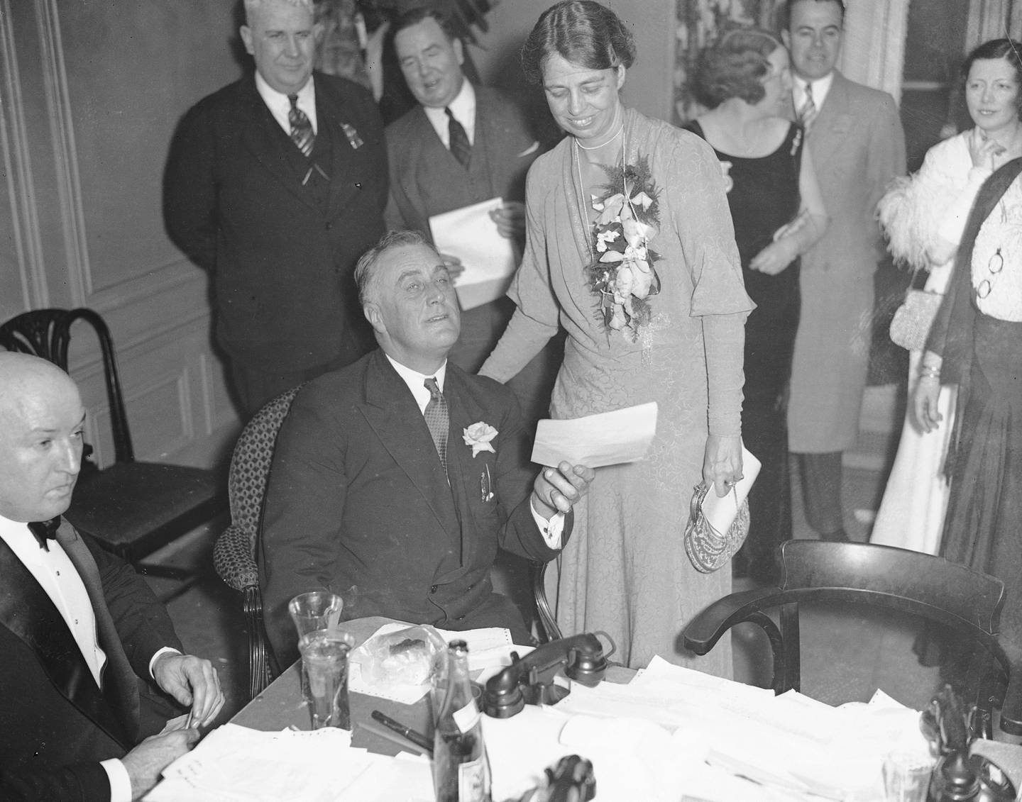 New York Gov. Franklin D. Roosevelt, the Democratic candidate for president, holds some of the telegrams of congratulations he received  on his victory in the election, Nov. 8, 1932. His wife Eleanor reads over his shoulder at their quarters at New York's Biltmore Hotel, after the governor received word of his overwhelming victory at the polls.