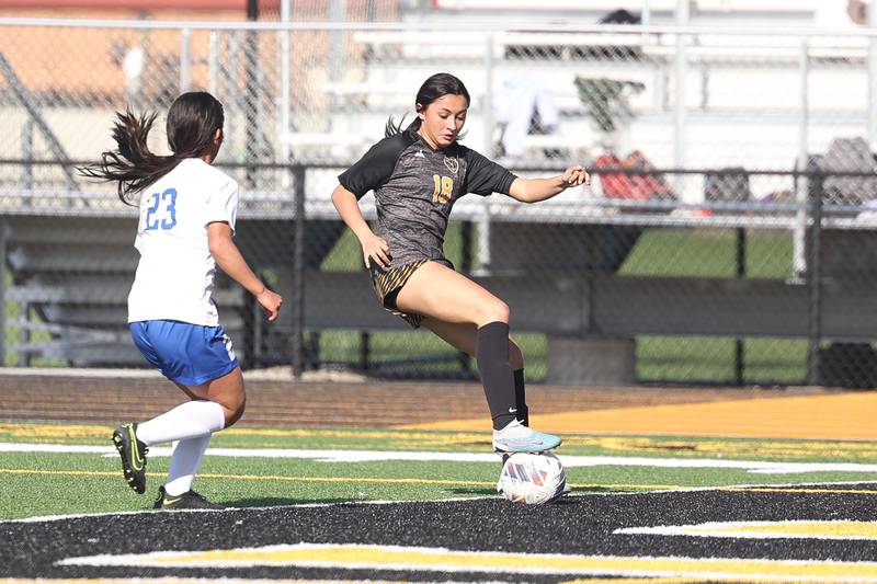 Joliet West’s Yaretzi Chavez works the ball against Joliet Central on Tuesday, April 30, 2024.