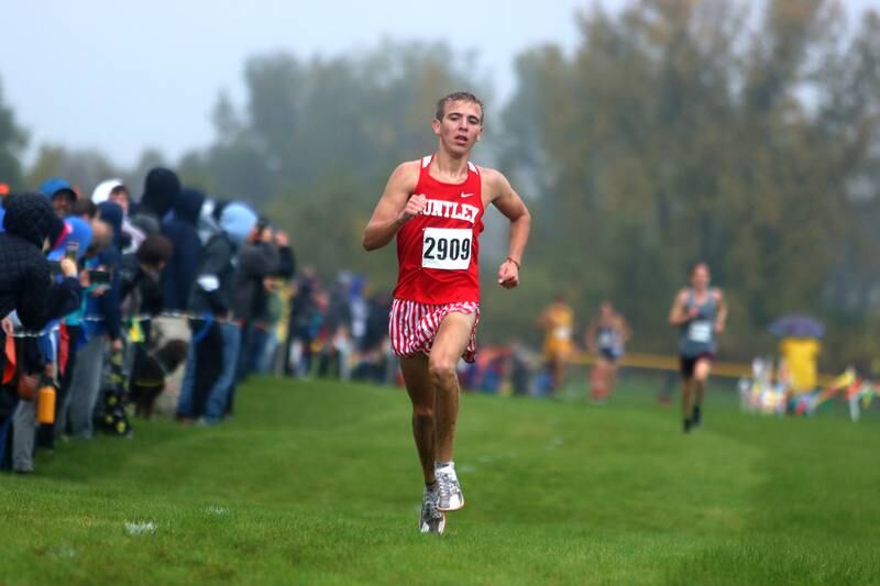 Huntley’s Tommy Nitz wins the Fox Valley Conference Boys Cross Country Meet at Plato Park in Elgin Saturday.