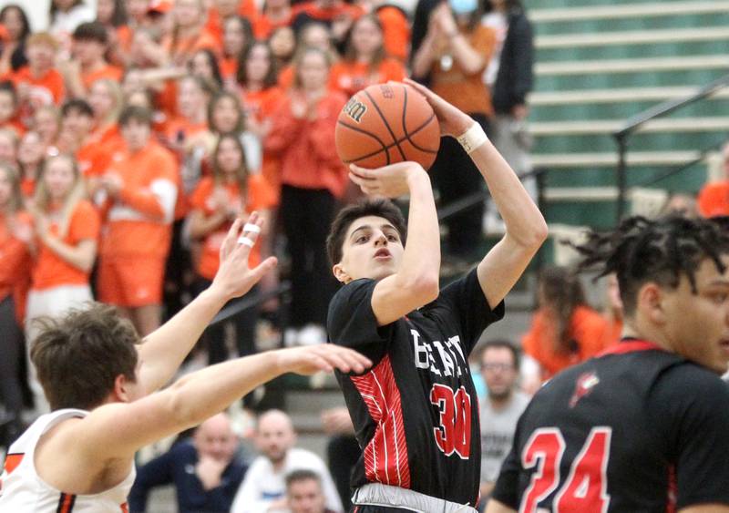 Benet’s Nikola Abusara (30) shoots the ball during a Class 4A Bartlett Sectional semifinal game against Wheaton Warrenville South on Wednesday, March 2, 2022.