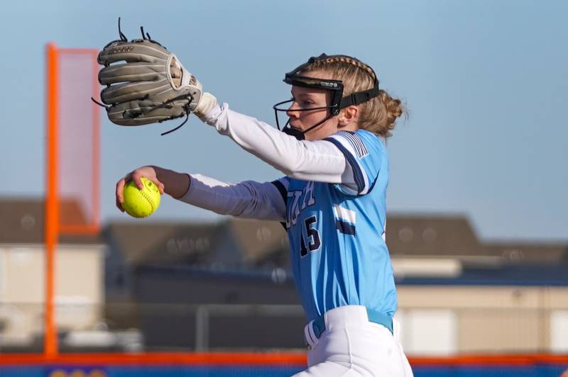 Downers Grove South's Morgan Hahn (15) delivers a pitch against Oswego during a softball game at Oswego High School on Tuesday, March 19, 2024.