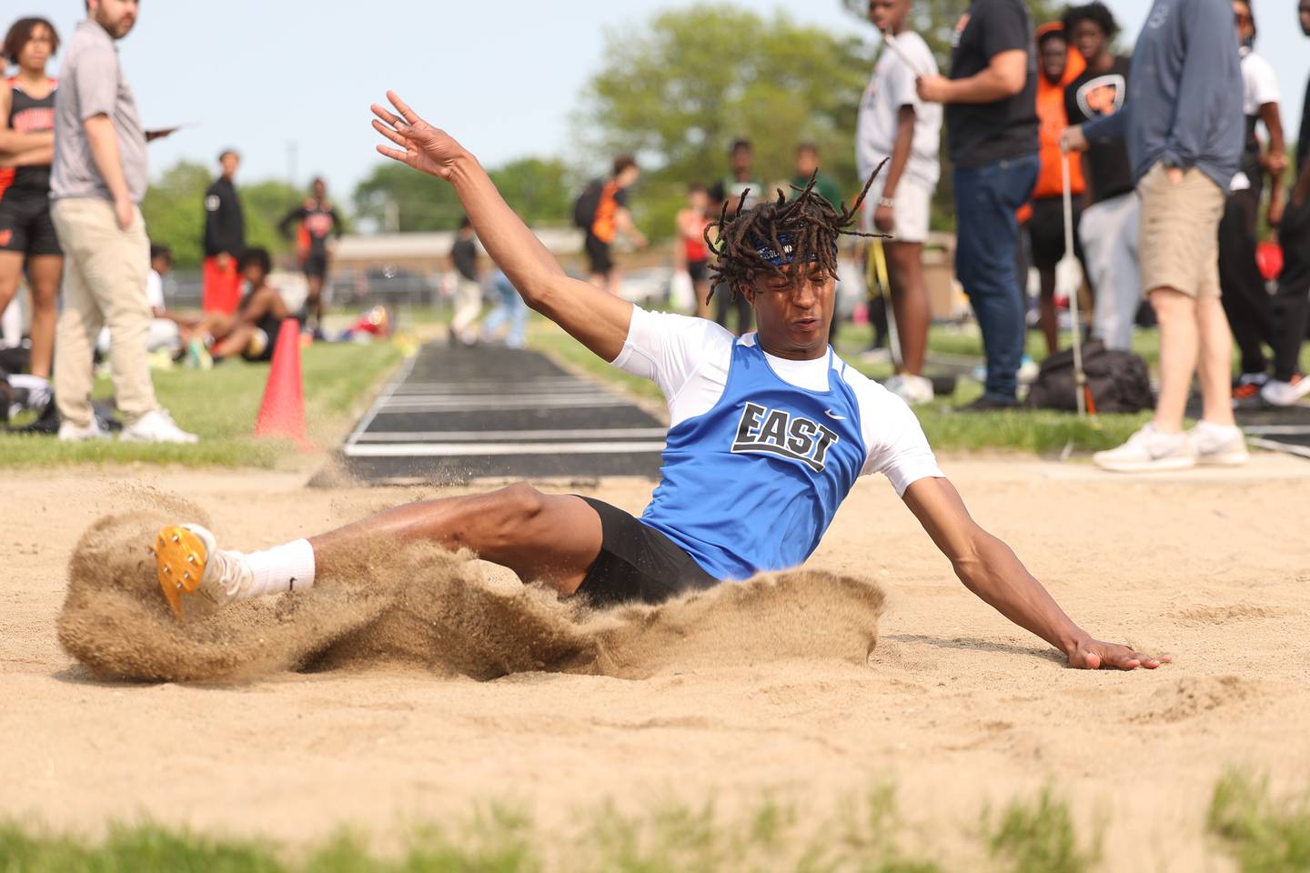 Lincoln-Way East’s Dedrick Richardson Jr competes in the Long Jump at the Class 3A Minooka Boys Track and Field Sectional on Wednesday, May 17, 2023 in Minooka. Dedrick finish first to move on to the State Finals.