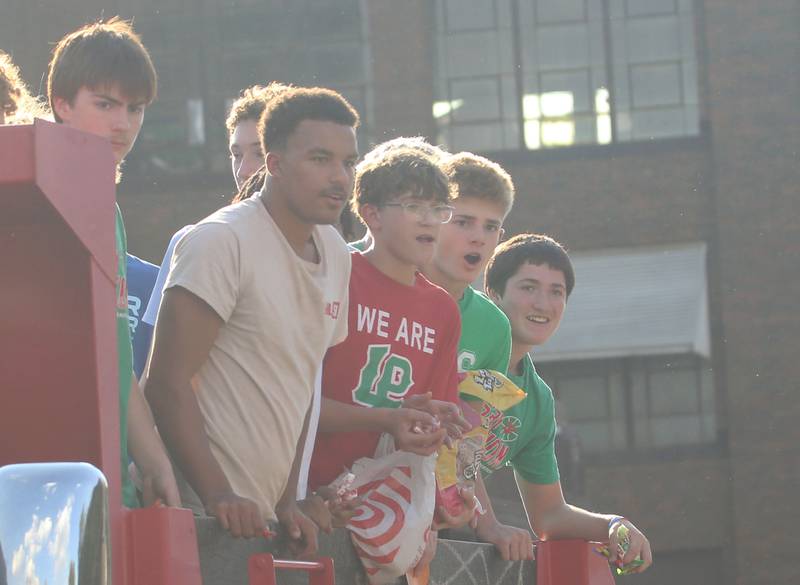 Members of the L-P boys basketball team ride a float during the L-P homecoming parade on Thursday, Oct. 2, 2025 downtown Peru.