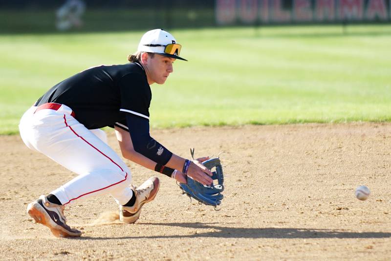 Bradley-Bourbonnais' Cody Freitas fields a grounder during a home game against Homewood-Flossmoor Friday, April 11, 2025.