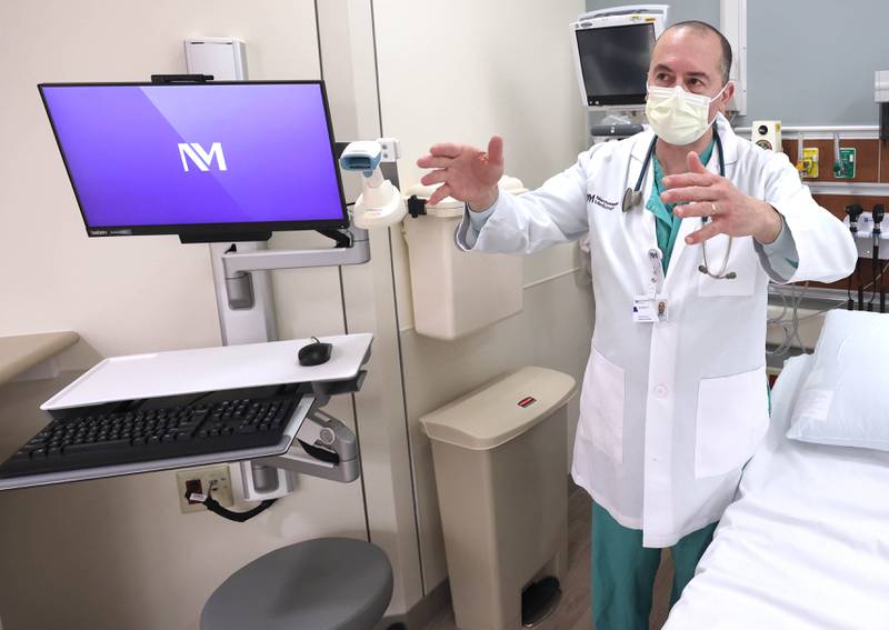 Dr. Jeremy Silver, medical director in the emergency department at Northwestern Medicine Kishwaukee Hospital, talks about the layout of one of the emergency room bays Monday, March 28, 2022, in the recently completed phase 2 of the three-phase renovation project in the ER at the facility.