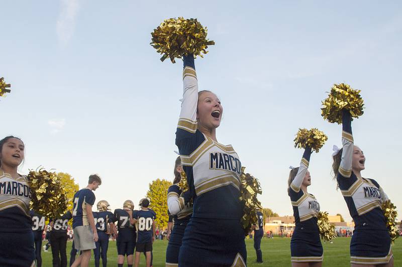 The Polo cheer squad fires up the fans early in the first game of the season Friday, Aug. 26, 2022 against Amboy.
