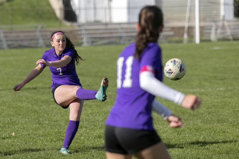 Dixon’s Madeline McLane takes a shot against North Boone Tuesday, April 15, 2025.