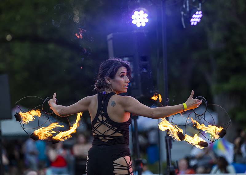 Fire performer Mirasia- Astral Kitty puts on a show Saturday, June 14, 2025, at Sauk Valley Pride Fest in Dixon.
