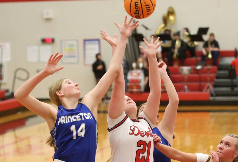 Princeton's Payton Brandt and Hall's Ava Delphi go after a rebound on Monday, Jan. 6, 2025 at Hall High School.