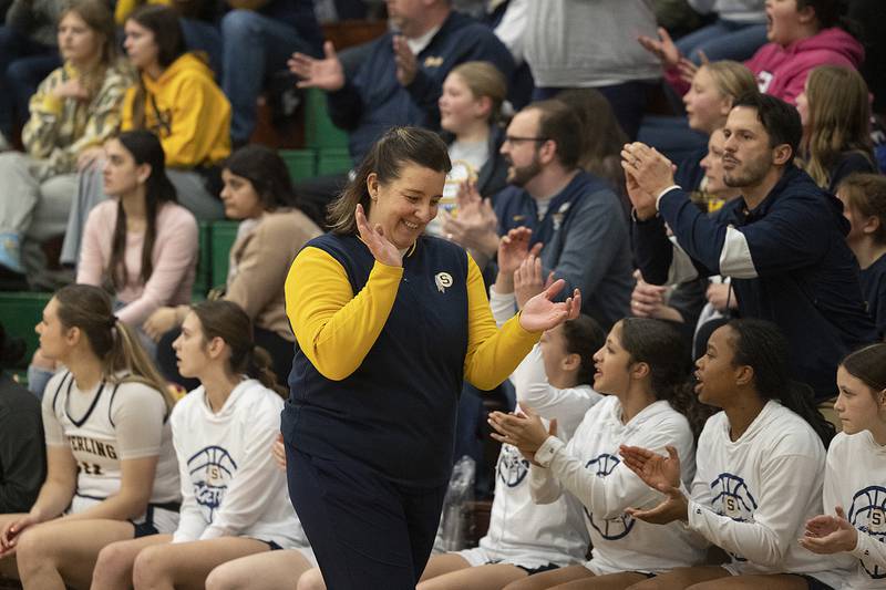 Sterling coach Taylor Jackson celebrates as time winds down in their win over Dixon Thursday, Feb. 27, 2025, during the Class 3A girls Sectional title at Rockford Boylan High School.