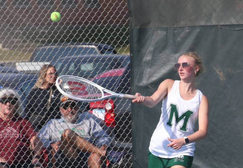 Kankakee-Mcnamara's Stella Kruse serves during the Class 1A girls tennis sectionals on Thursday, Oct. 16, 2025 at Ottawa High School.