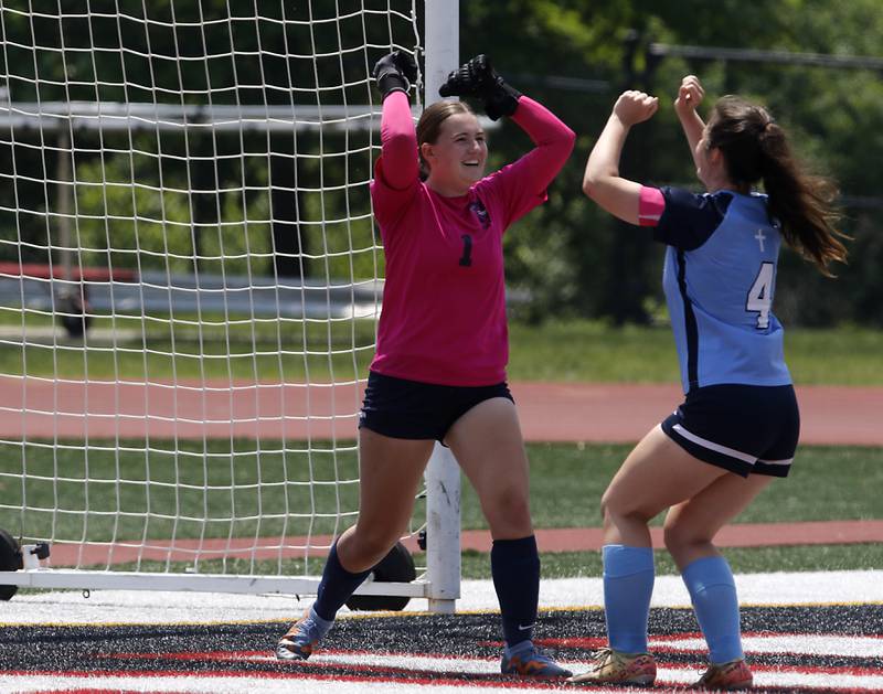 Nazareth Academy's Ana Djurasovic celebrates stoping a shot on goal with her teammate, Izzy Strnic, during a IHSA Class 2A State Girls Soccer semifinal match on Friday, June 6, 2025, at North Central College in Naperville.