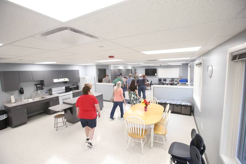 Visitors walk through the sensory room at the Lighted Way building during the ribbon cutting and dedication on Saturday, Aug. 5, 2023 in La Salle.