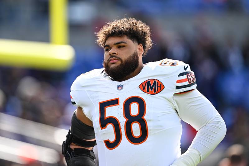 Chicago Bears offensive tackle Darnell Wright (58) looks on during pre-game warm-ups before an NFL football game against the Baltimore Ravens, Sunday, Oct. 26, 2025, in Baltimore. (AP Photo/Terrance Williams)