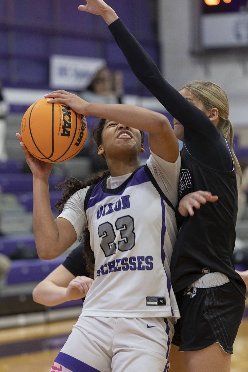 Dixon’s Ahmyrie McGowan puts up a shot against Kaneland Wednesday, Dec. 10, 2025.