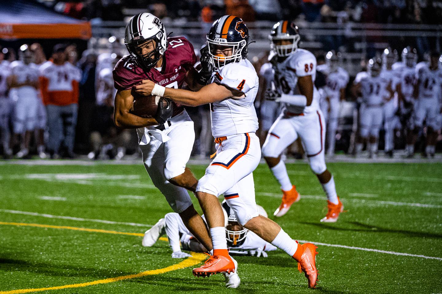 Oswegos Colin Rowe takes down Plainfield Norths Sean Schlanser during a game  Friday Sept. 30, 2022 at Plainfield North High School