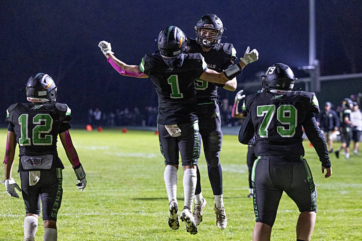 Rock Falls’ Easton Canales (left) and Mason Landes celebrate a third quarter TD against Winnebago Friday, Oct. 20, 2023 in Rock Falls.