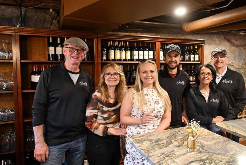Geneva Wine Cellar & Tasting Room owners Angela and Jordan Moore of Carol Stream purchased the business with their parents Dale and Lynn Engebretson of Carol Stream and Fatima and Tim Moore of St. Charles.