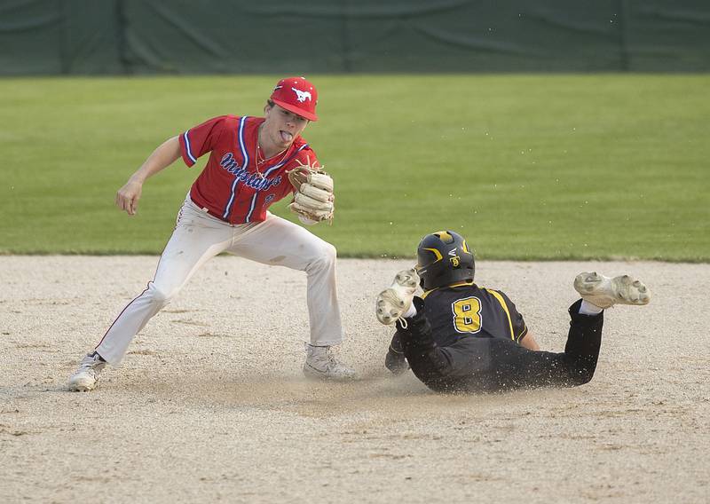 Morrison’s Danny Mouw is late on tagging out AFC’s Aaron Lester stealing second Wednesday, May 17, 2023.
