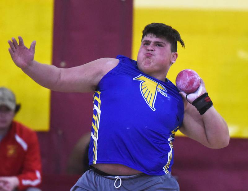 Wheaton North’s Caleb Varney competes in shot put during the DuKane boys indoor track meet at Batavia High School Saturday.