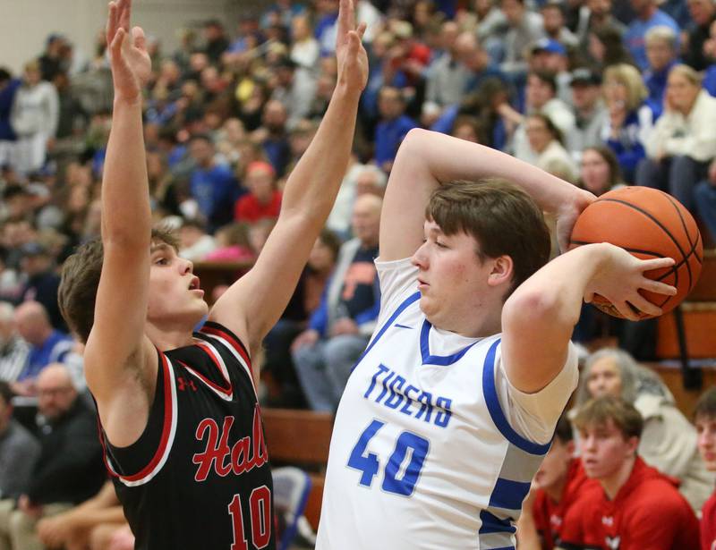 Princeton's Wyatt Koning looks to pass the ball around Hall's Greyson Bickett on Friday, Jan. 26, 2024 at Princeton High School.